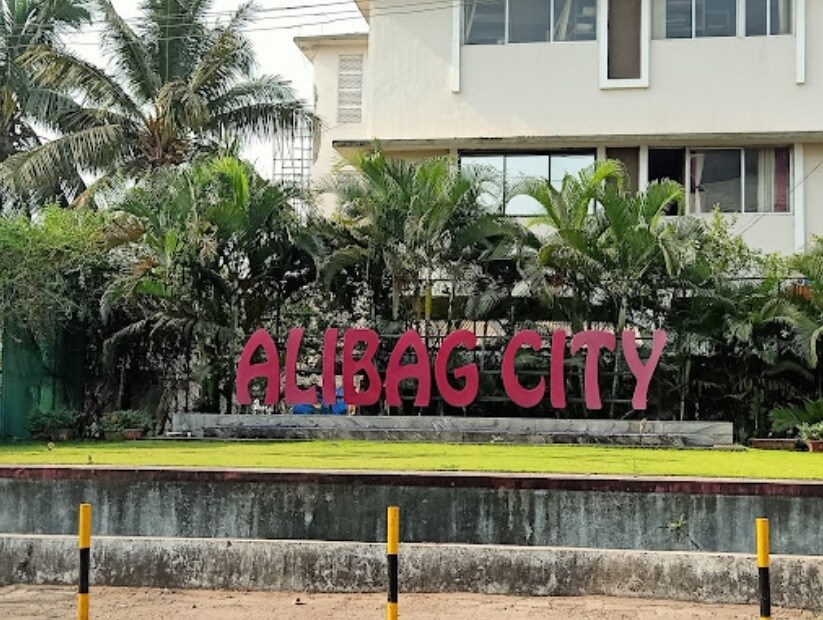 Alibag_a sign that is on the side of a building